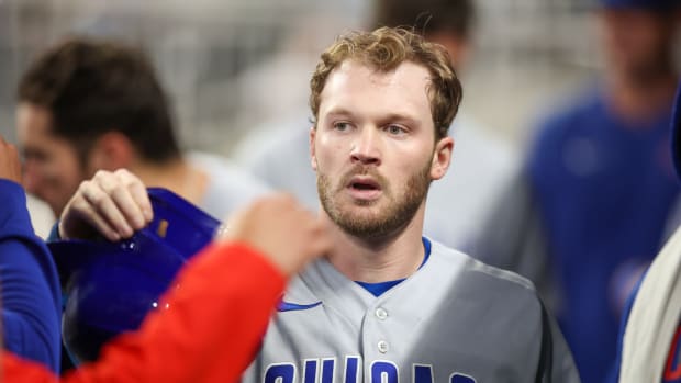 Sep 28, 2023; Atlanta, Georgia, USA; Chicago Cubs left fielder Ian Happ (8) celebrates with teammates after scoring a run against the Atlanta Braves in the sixth inning at Truist Park. Mandatory Credit: Brett Davis-USA TODAY Sports  